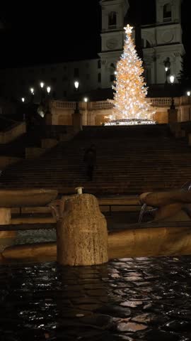 The Christmas tree in Piazza di Spagna in Trinità dei Monti in Rome, Italy.
Aerial drone shot of the steps and fountain (the Barcaccia), during the Christmas holidays.