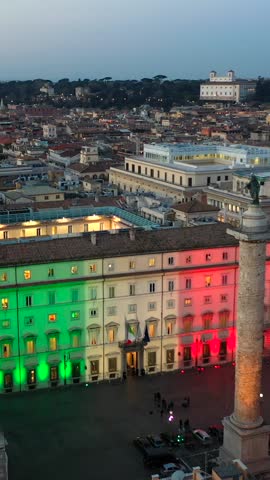 Palazzo Chigi illuminated by the tricolor, seat of the Italian Government. Rome, Italy.
Aerial view of Palazzo Chigi, with the Italian flag projected on the facade.