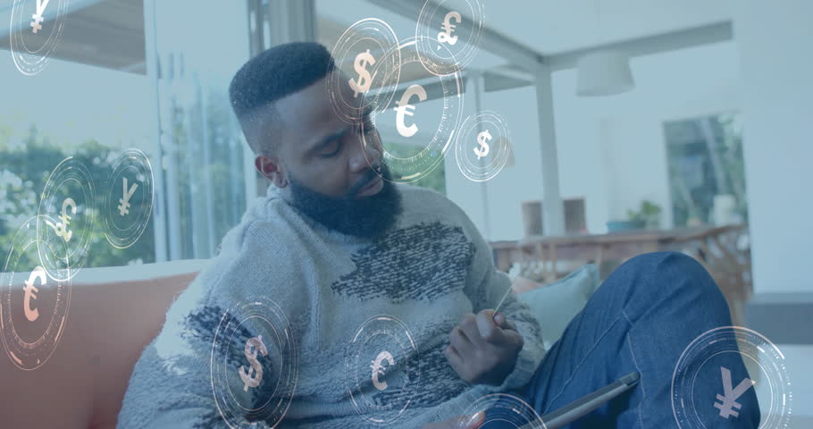 Animation of currency icons and data over african american man paying online with card. Global online banking, finance, business, connections and data processing concept digitally generated video.