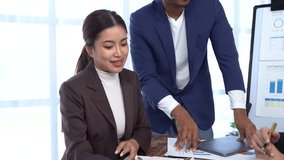 Diverse team of business professionals are having a productive meeting, analyzing financial data and strategizing for success - Powered by Shutterstock - Get 15% off with code: PIKWIZARD15