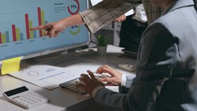 Business team working late, analyzing financial data displayed on a computer screen for strategic planning and decision making - Powered by Shutterstock - Get 15% off with code: PIKWIZARD15