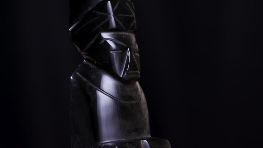 Obsidian Aztec Totem Statue Figurine Rotating on Black Background Turntable