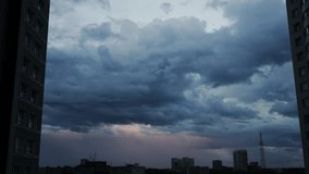 Timelapse showcasing dark clouds swirling over a city skyline. The scene captures the clouds shifting and morphing as the atmosphere grows increasingly ominous - Powered by Shutterstock - Get 15% off with code: PIKWIZARD15