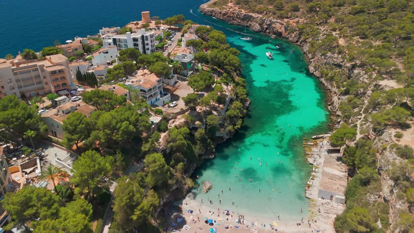 Aerial view of the Bay of Cala Pi in Mallorca, Balearic Islands, Spain. Stunning Mediterranean Sea coast with turquoise water sea bay and white sand beach. Mallorca travel destinations