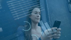 Animation of data processing and diagrams over caucasian woman using smartphone in city. Global business and digital interface concept digitally generated video. - Powered by Shutterstock - Get 15% off with code: PIKWIZARD15