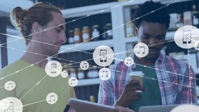 Animation of network of connections with music icons over diverse men with tablet. Global finance, business, connections, computing and data processing concept digitally generated video. - Powered by Shutterstock - Get 15% off with code: PIKWIZARD15