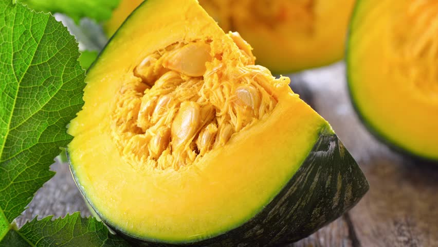 fresh pumpkin on wooden background