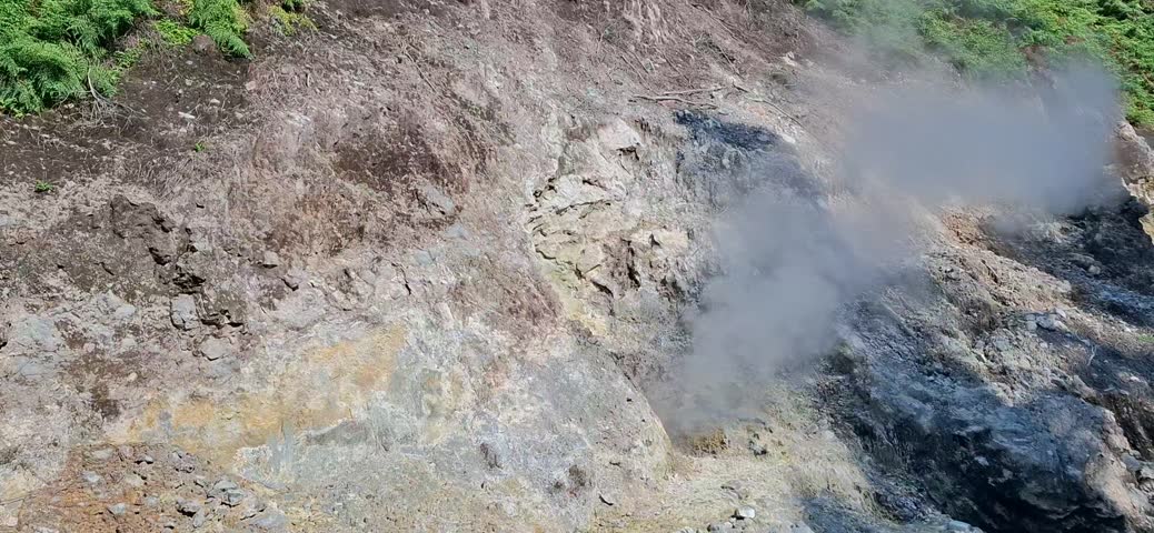 sulfur springs at the foot of the mountain