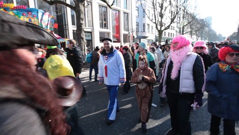 DUSSELDORF, GERMANY – FEBRUARY 10: People present their costumes for the next day celebration of Rosenmontag Karneval or Carnival. February 10, 2013,  Düsseldorf, Germany
