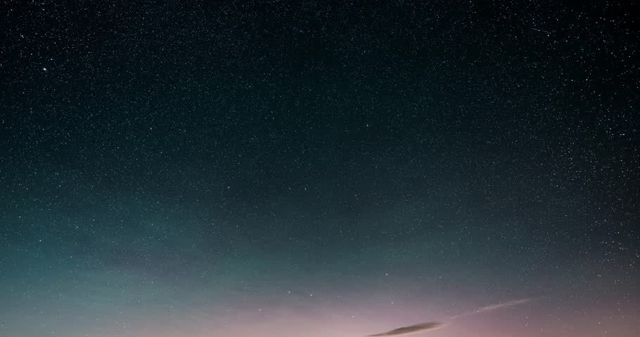 Dark starry night sky with stars and red aurora borealis in Astronomy background Time lapse