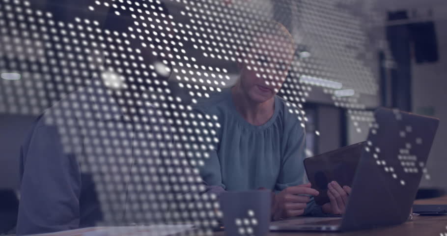 Animation of financial data processing over diverse business people in office. Global finance, business, connections, computing and data processing concept digitally generated video.