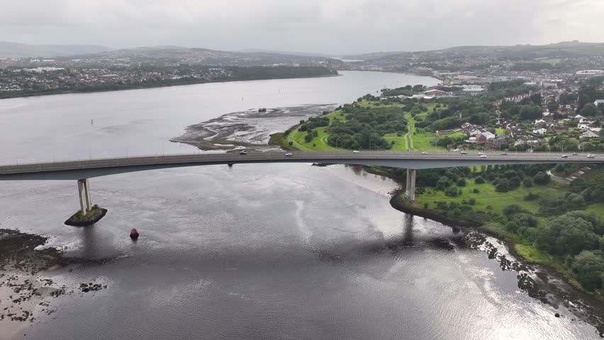 Aerial view of the Foyle Bridge over the river Foyle and Derry Londonderry Northern Ireland 