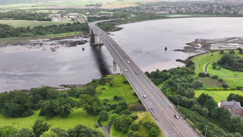 Aerial view of the Foyle Bridge over the river Foyle and Derry Londonderry Northern Ireland 