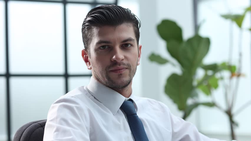 Male businessman in close-up working on a laptop green screen