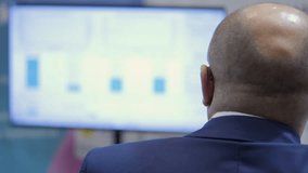 A dedicated professional with expertise in data analysis during a key presentation featuring various charts - Powered by Shutterstock - Get 15% off with code: PIKWIZARD15