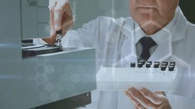 Animation of dna and scientific data processing over caucasian male scientist in laboratory. Global science, connections, computing and data processing concept digitally generated video. - Powered by Shutterstock - Get 15% off with code: PIKWIZARD15