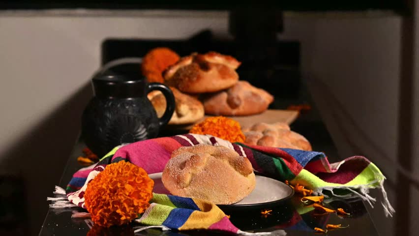 Pan de Muerto. Typical Mexican sweet bread that is consumed in the season of the day of the dead. It is a main element in the altars and offerings in the festivity of the day of the dead.