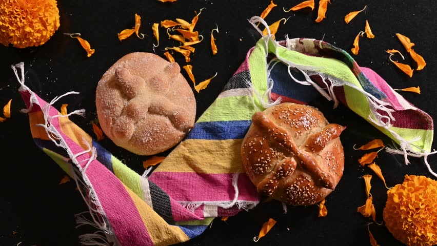 Pan de Muerto. Typical Mexican sweet bread that is consumed in the season of the day of the dead. It is a main element in the altars and offerings in the festivity of the day of the dead.