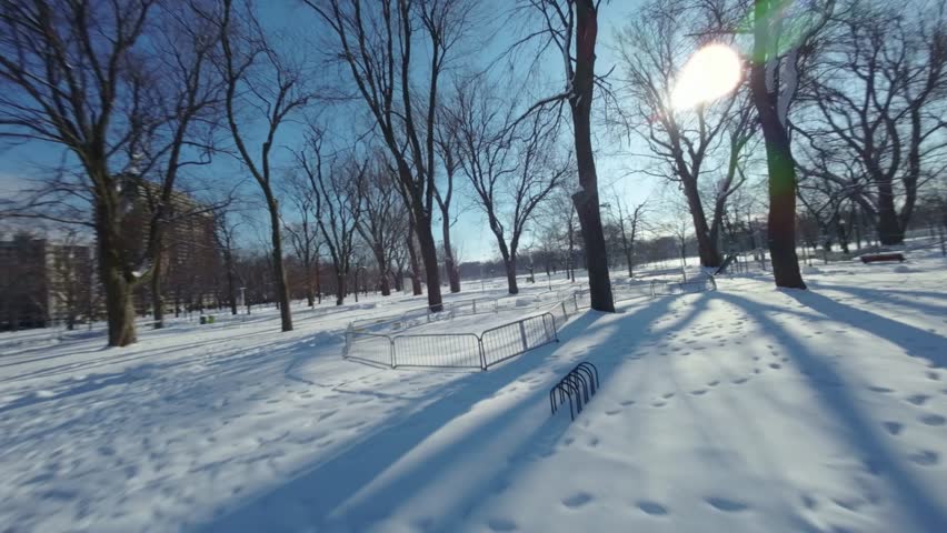 Playground winter at Parc Lafontaine, Montreal, Canada. Fpv shot.