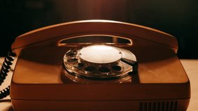 Retro vintage phone, A yellow rotary telephone is displayed on a wooden desk, adding a nostalgic touch - Powered by Shutterstock - Get 15% off with code: PIKWIZARD15