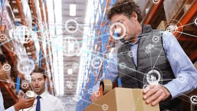 Animation of network of connections with icons over caucasian male workers working in warehouse. Global business, teamwork and digital interface concept digitally generated video. - Powered by Shutterstock - Get 15% off with code: PIKWIZARD15
