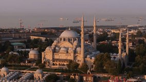 Beautiful Aerial View Above Suleymaniye Mosque at Sunrise, Oil Tanker Ships in Background - Powered by Shutterstock - Get 15% off with code: PIKWIZARD15