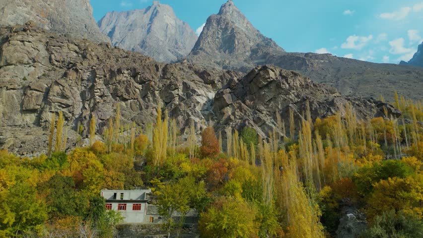 Skardu valley with rockface and mountain range in background, Karakoram mountain range, Aerial