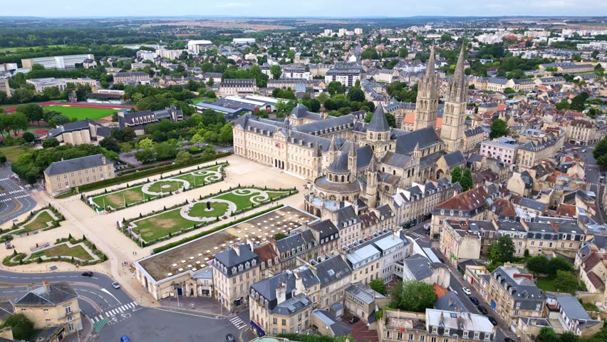 Abbey of Saint-Étienne or Abbaye aux Hommes or Abbey men, Caen in Normandy, France. Aerial drone sideways and cityscape