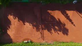 Aerial View 4K: Dusty Duels - Tennis Matches on a Gravel Court - Powered by Shutterstock - Get 15% off with code: PIKWIZARD15