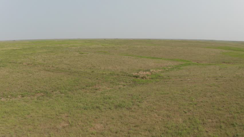 Aerial Drone Flying Over Vast Endless Flint Hills Kansas Great Plains Prairie Grassland in Summer