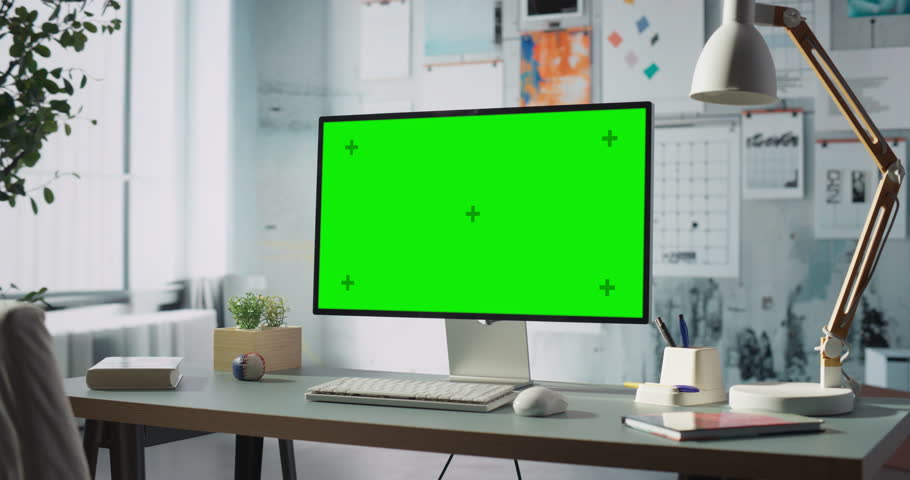 Modern Workspace Features Desktop Computer With Green Screen Chroma Key Display. Engineering, Creative Work, Clean Modern Desing. No people static shot
