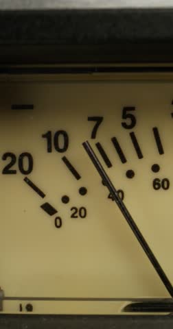 Movement of the arrow on the sound level meter, close-up. Recording Studio