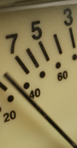 Movement of the arrow on the sound level meter, close-up. Recording Studio