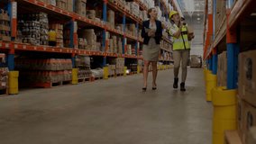 Animation of network of connections over caucasian female worker and supervisor in warehouse. Global delivery, technology and digital interface concept digitally generated video. - Powered by Shutterstock - Get 15% off with code: PIKWIZARD15