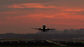 Passenger airplane taking off from the runway against a stunning sunset backdrop, highlighting the beauty of evening skies - Powered by Shutterstock - Get 15% off with code: PIKWIZARD15