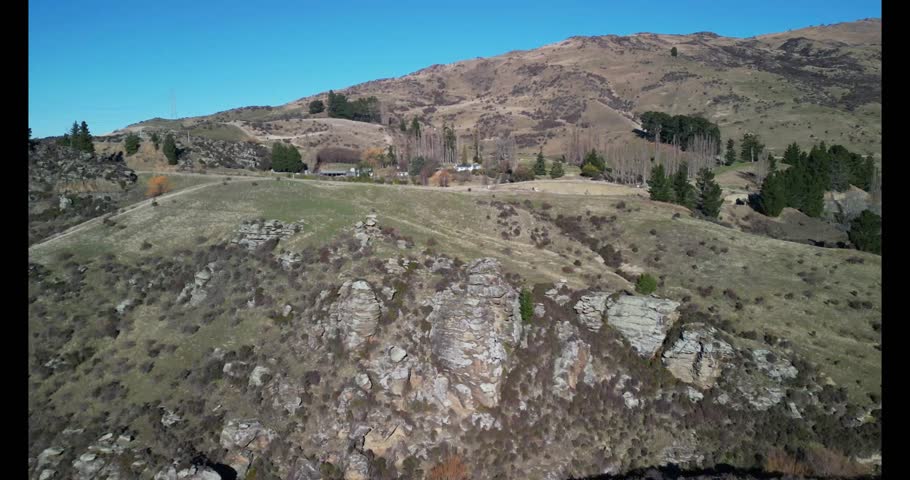 An aerial footage of the rock formations at Flat Top Hill Conservation Area in Butchers Gully, Otago, South Island, New Zealand