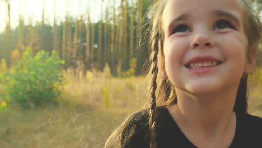Video portrait of happy girl trick or treating for halloween. Childhood, halloween, tradition and fun concept.