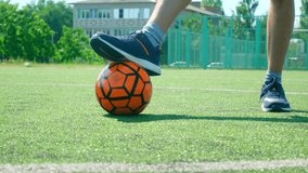Active young male playing with ball, dribbling ball, training on court - Powered by Shutterstock - Get 15% off with code: PIKWIZARD15