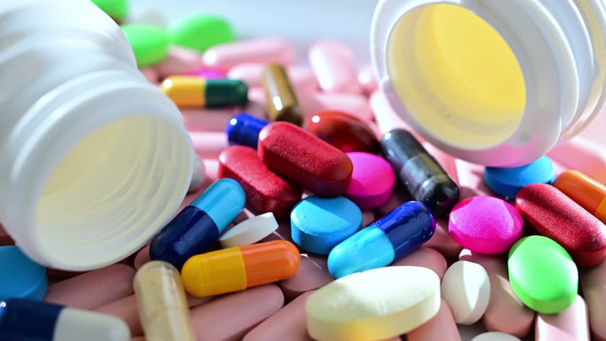 A variety of drug pills and dietary supplement capsules