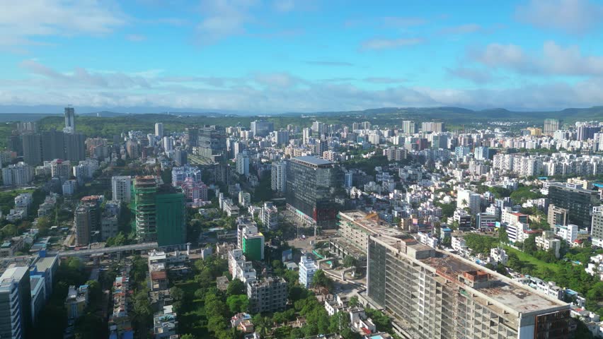 Aerial view of Mumbai Pune City, Maharashtra, India. Drone shot of Pune skyline, beautiful cloudy weather during monsoon