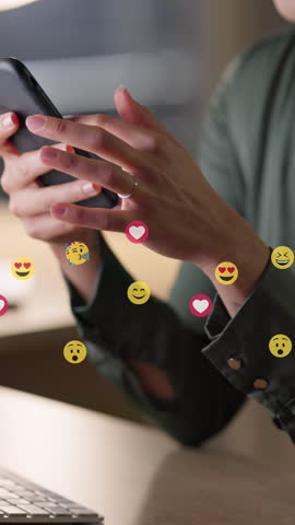 Hands, woman and smartphone at office with emoji on social media, dating app or website for fun. Closeup, female person and texting on internet for networking, communication or connection on overlay