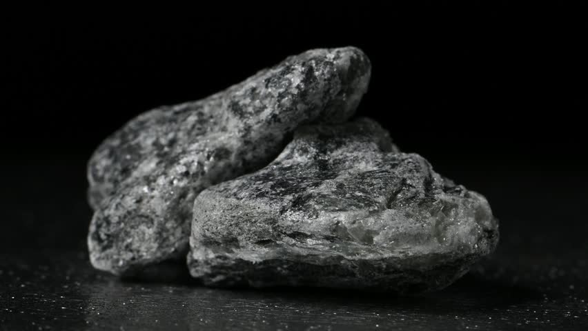 Talc (hydrated magnesium silicate - Mg3Si4O102) sample rotating slowly against a black background [Norway]