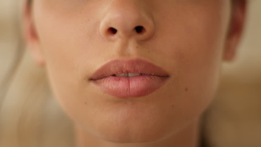 Close up cropped view female mouth unrecognizable woman girl lady Indian Arabian smiling healthy teeth toothy smile laugh whitening dental oral clinic medicine health indoors at home clinic half face