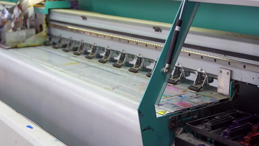 Plotter printing. Printing services and printing. Plotter prints image on arakal. Plotter prints stickers.