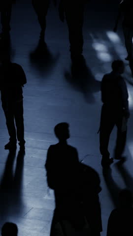 Silhouetted Figures in Dynamic Motion Against a Background of Urban Life and Energy