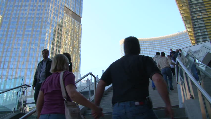 LAS VEGAS, NEVADA, CIRCA 2012: People walk up and down stairs near the Aria