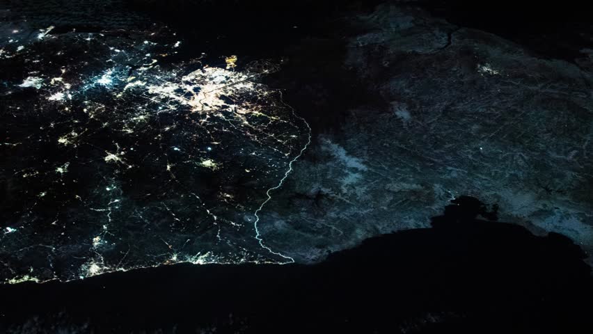 Korean Peninsula flying over, night lights city of Seoul and north south Korea border aerial view from satellite. Animation based on image by Nasa
