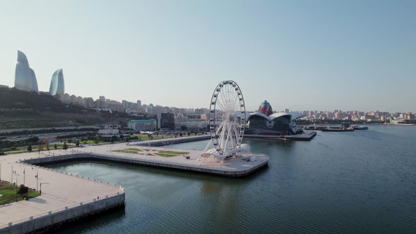 Stunning aerial panorama of Baku skyline, the Flame Towers, Baku Eye, the F1 Grand Prix track along the Caspian Sea, Baku, Azerbaijan, Central Asia, Asia