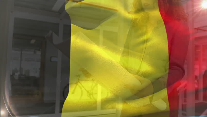 Animation of flag of belgium waving over smiling caucasian female architect holding blueprints. Belgian, business, architecture, design and development, digitally generated video.