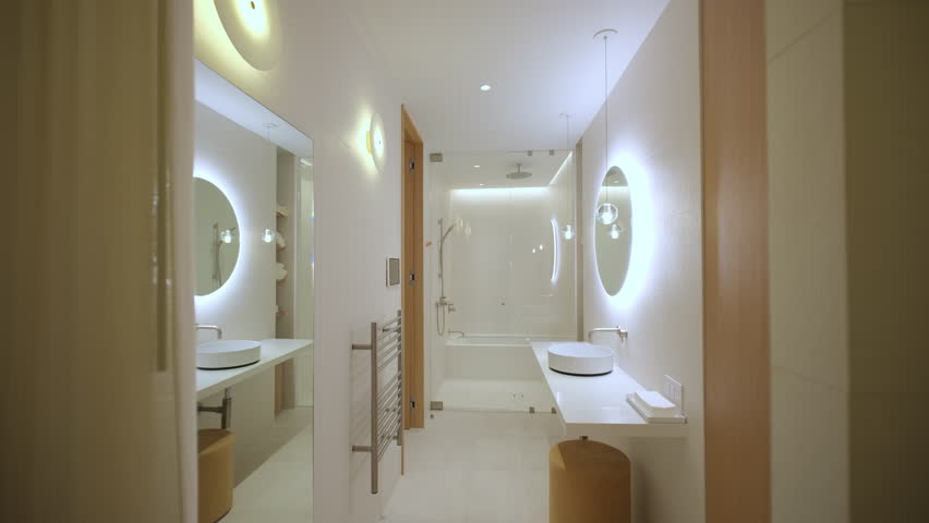 Wide view of Elements of Modern Bathroom with Shower in home, real estate interior. Move camera 